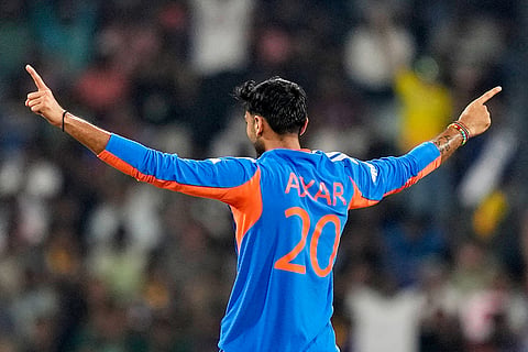 India's Axar Patel celebrates the wicket of Pakistan's Babar Azam during the T20 World Cup cricket match between India and Pakistan in Colombo, Sri Lanka.
