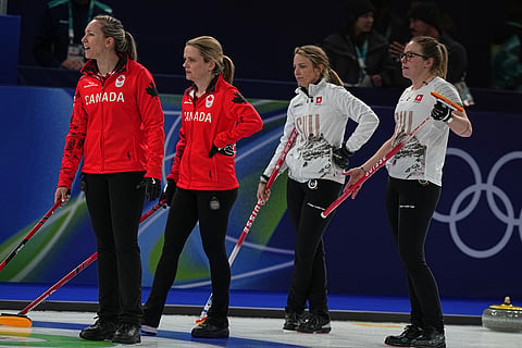 Canada's Rachel Homan and Tracy Fleury compete against Switzerland's Silvana Tirinzoni and Alina Paetz during the women's curling round robin session at the 2026 Winter Olympics, in Cortina d'Ampezzo, Italy.