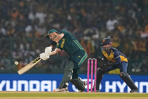 Australia's Glenn Maxwell hits a six during the T20 World Cup cricket match between Sri Lanka and Australia in Pallekele, Sri Lanka.