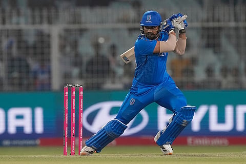 Italy's Jaspreet Singh plays a shot during the T20 World Cup cricket match between England and Italy in Kolkata, India.