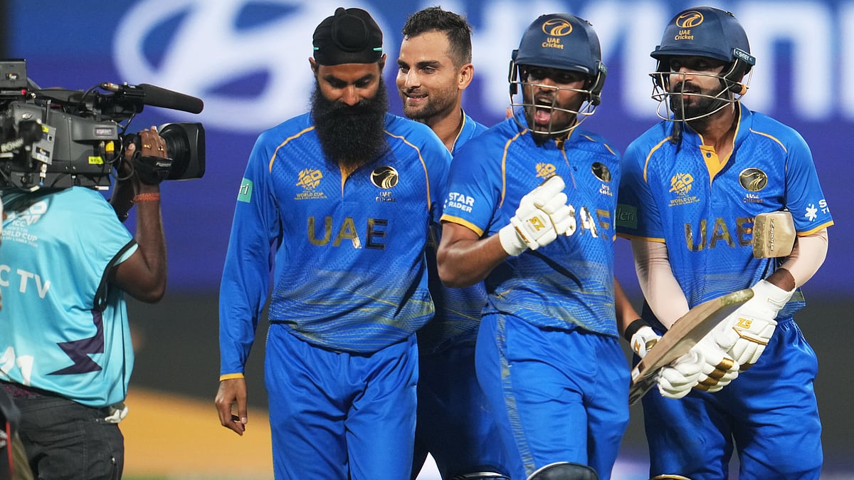 | Photo: AP/Manish Swarup : A broadcaster films United Arab Emirates' Aryansh Sharma, second left with Muhammad Arfanduring, right and other teammates reacts after winning the game over Canada the T20 World Cup cricket match between Canada and United Arab Emirates in New Delhi, India, Friday, Feb. 13, 2026. 