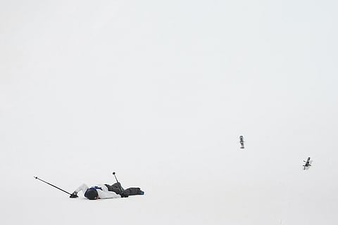 Finland's Elias Lajunen crashes during the men's freestyle skiing big air qualifications at the 2026 Winter Olympics, in Livigno, Italy.