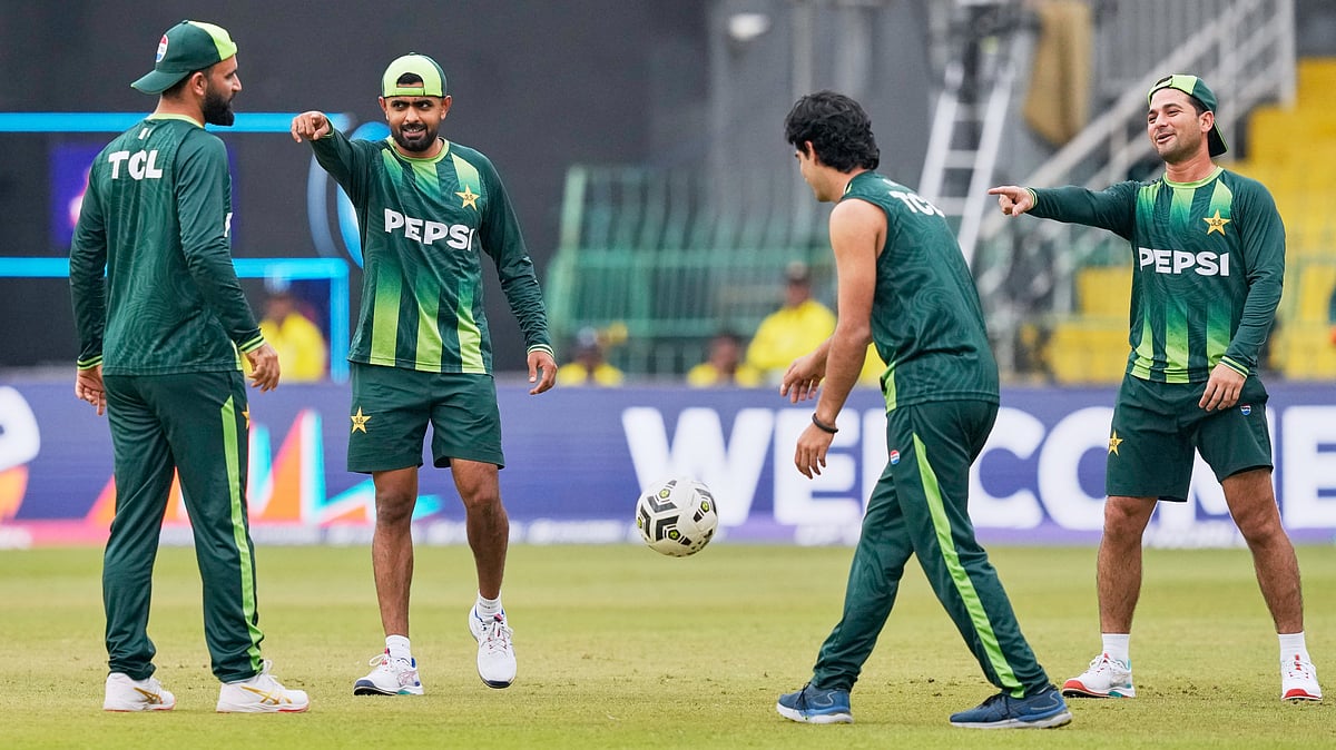 | Photo: AP/Eranga Jayawardena : Pakistan's Babar Azam, second left, warms up with teammates before the start of the T20 World Cup cricket match between India and Pakistan in Colombo, Sri Lanka, Sunday, Feb. 15, 2026.