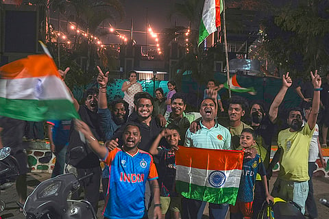 Fans burst firecrackers as they celebrate India's victory over Pakistan in an ICC Men's T20 World Cup 2026 cricket match, at Shivaji Park, in Mumbai, Maharashtra.
