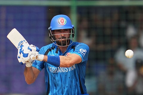 Afghanistan's Ibrahim Zardan plays a shot during the T20 World Cup cricket match between Afghanistan and United Arab Emirates in New Delhi.