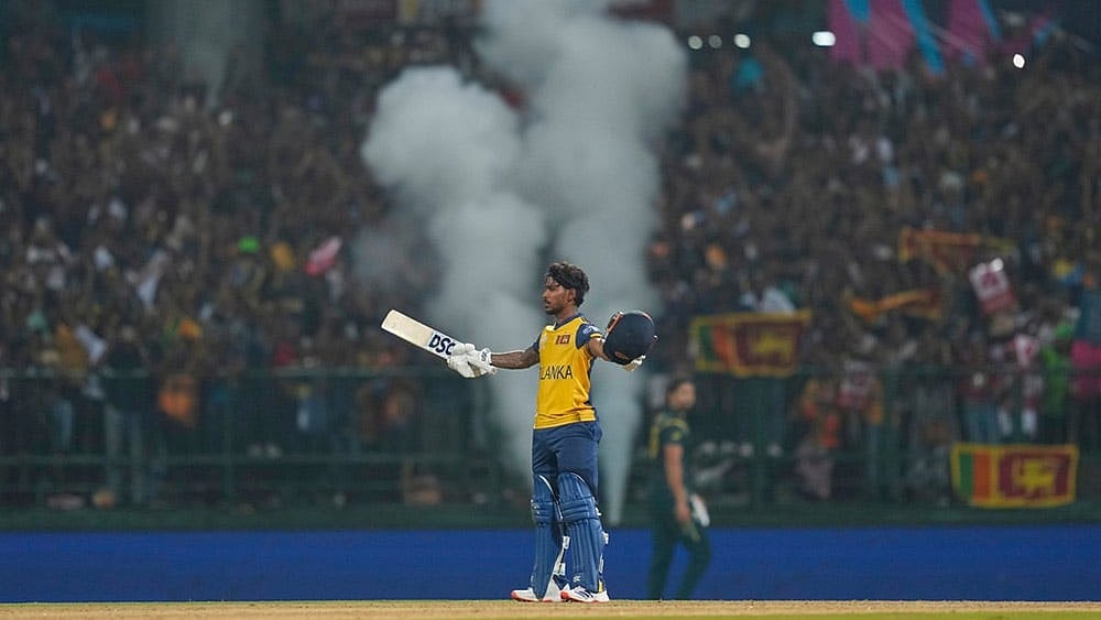 Photo: AP/Eranga Jayawardena : Sri Lanka's Pathum Nissanka celebrates his century during the T20 World Cup cricket match between Sri Lanka and Australia in Pallekele, Sri Lanka.