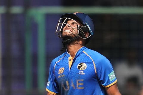 United Arab Emirates' Sohaib Khan reacts after loosing his wicket during the T20 World Cup cricket match between Afghanistan and United Arab Emirates in New Delhi.