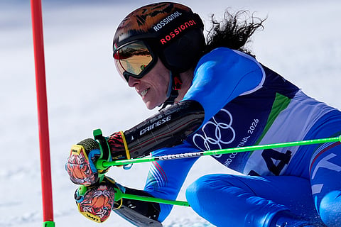 Italy's Federica Brignone speeds down the course, during an alpine ski, women's giant slalom race, at the 2026 Winter Olympics, in Cortina d'Ampezzo, Italy.