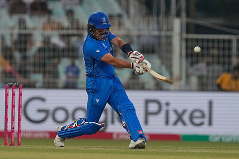 Italy's captain Harry Manenti plays a shot during the T20 World Cup cricket match between England and Italy in Kolkata, India.