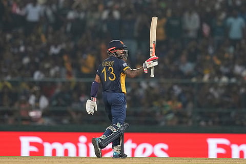 Sri Lanka's Kusal Mendis celebrates his fifty runs during the T20 World Cup cricket match between Sri Lanka and Australia in Pallekele, Sri Lanka.
