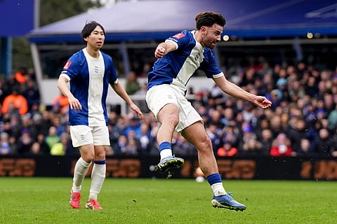 Birmingham City's Patrick Roberts, right, celebrates after scoring his side's first goal during the Emirates FA Cup fourth round match in Birmingham, England.