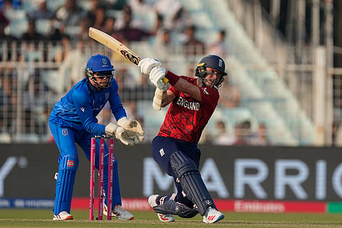 England's Sam Curran hits a six during the T20 World Cup cricket match between England and Italy in Kolkata, India.