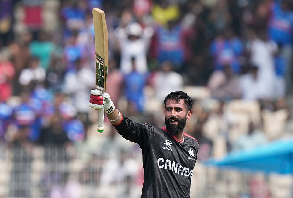 | Photo: AP/Mahesh Kumar A. : Canada's Yuvraj Samra celebrates his century during the T20 World Cup cricket match between Canada and New Zealand in Chennai.