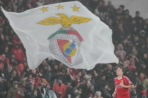 Benfica's Andreas Schjelderup celebrates after scoring his side's third goal during a Champions League opening phase soccer match between Benfica and Real Madrid, in Lisbon.