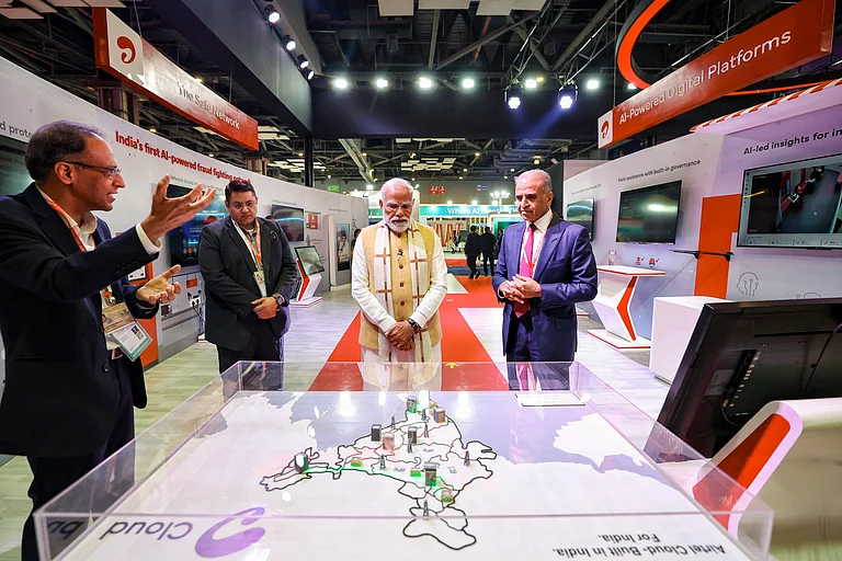 In this image received on Feb. 16, 2026, Prime Minister Narendra Modi during the inauguration of India AI Impact Expo, at Bharat Mandapam in New Delhi. Bharti Enterprises Chairman Sunil Bharti Mittal also seen. (PMO via PTI Photo)
- Source: PTI