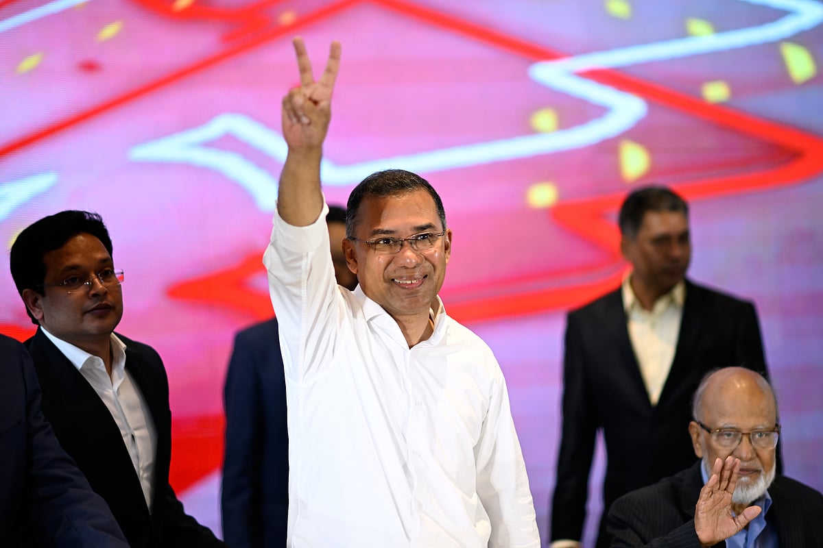 MAHMUD HOSSAIN OPU Source: AP : Bangladesh Nationalist Party Chairperson Tarique Rahman greets supporters after his party won the national parliamentary election, in Dhaka, Bangladesh, Saturday, Feb. 14, 2026. (AP Photo/Mahmud Hossain Opu)

