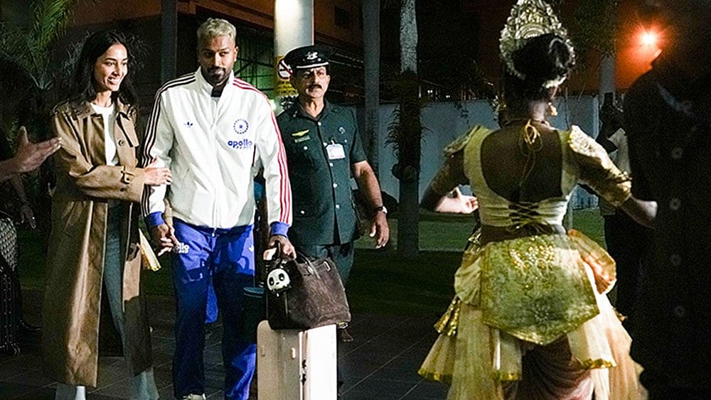 Photo: PTI/Arun Sharma : India's Hardik Pandya with his girlfriend and model Mahieka Sharma arrives at the airport, ahead of the ICC Men's T20 World Cup 2026 cricket match against Pakistan, in Colombo, Sri Lanka.