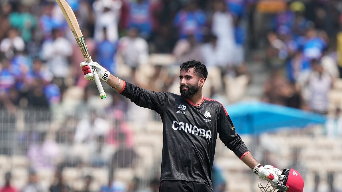 AP Photo : Canada's Yuvraj Samra celebrates his century during the ICC T20 World Cup cricket match between Canada and New Zealand in Chennai.