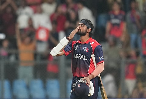 Nepal's Dipendra Singh Airee acknowledges cricket fans after his team won against /Scotland during the T20 World Cup cricket match in Mumbai.