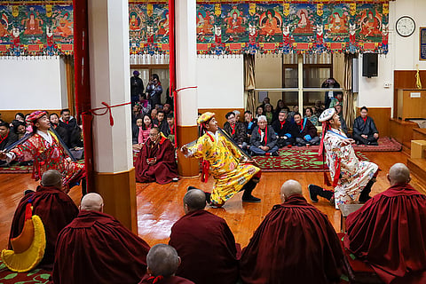 People perform on the first day of 'Losar 2026', the Tibetan New Year, in Kangra district of Himachal Pradesh.