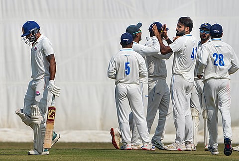 Kalyani: Bengal's Akash Deep with teammates celebrates the wicket of Jammu and Kashmir's captain Paras Dogra during the fourth day of the Ranji Trophy semifinal cricket match between Jammu and Kashmir and Bengal, at the Bengal Cricket Academy Ground, in Kalyani, West Bengal.