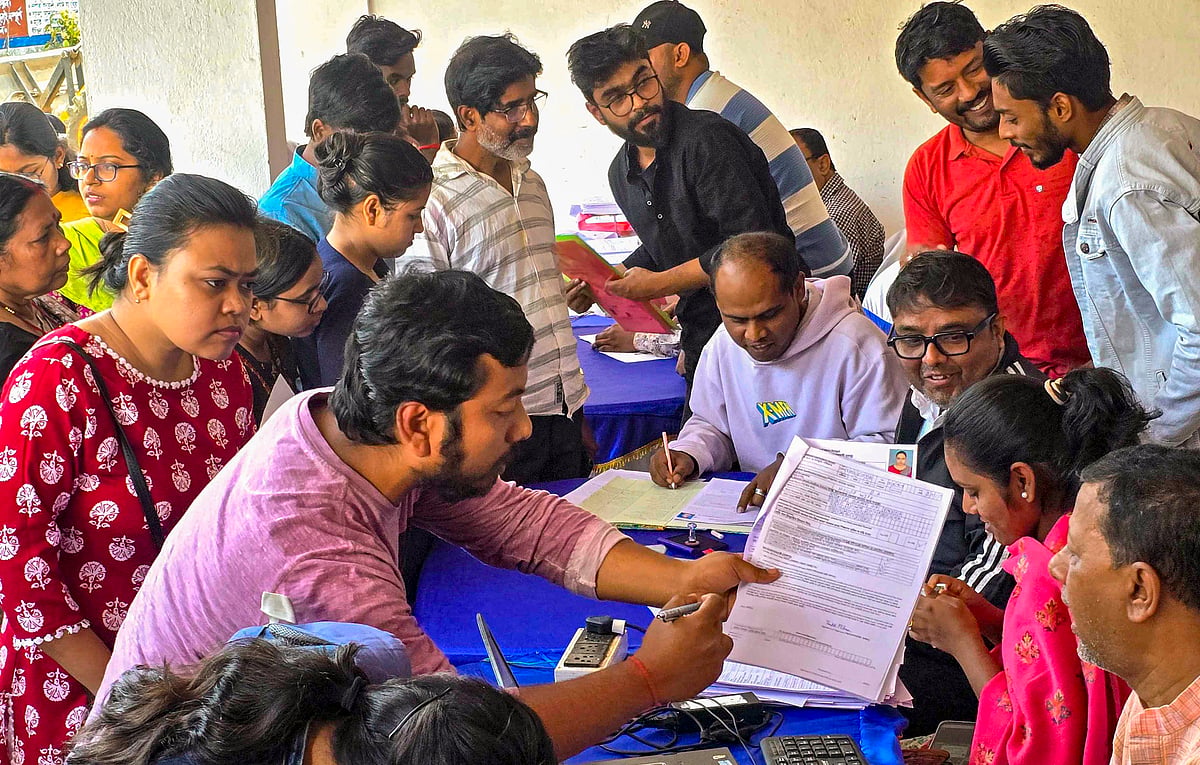 PTI : People gather at the Suri Municipality office after the West Bengal government launched the Banglar Yuva Sathi scheme, in Birbhum district, West Bengal, Monday, Feb. 16, 2026