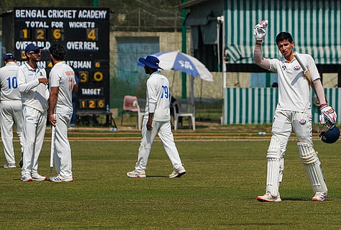 Jammu and Kashmir's Vanshaj Sharma, right, celebrates after the team's victory in the Ranji Trophy semifinal cricket match against Bengal, at the Bengal Cricket Academy Ground, in Kalyani, West Bengal.