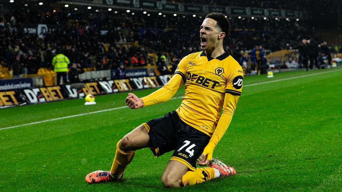 Tom Edozie celebrates his dramatic equaliser against Arsenal