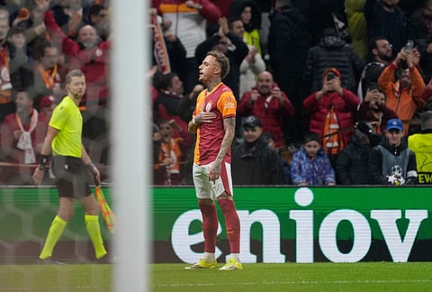 Galatasaray's Noa Lang celebrates after scoring his side's fourth goal during a Champions league play-off first leg soccer match between Galatasaray and Juventus, in Istanbul, Turkey.