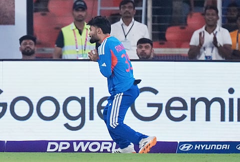India's Rinku Singh takes the catch to dismiss Netherlands' Colin Ackermann during the T20 World Cup cricket match between India and Netherlands in Ahmedabad.
