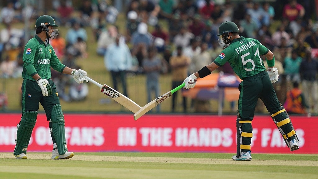 Photo: AP : Pakistan's Sahibzada Farhan, right, and Saim Ayub, left, bat during the T20 World Cup match between Namibia and Pakistan in Colombo.