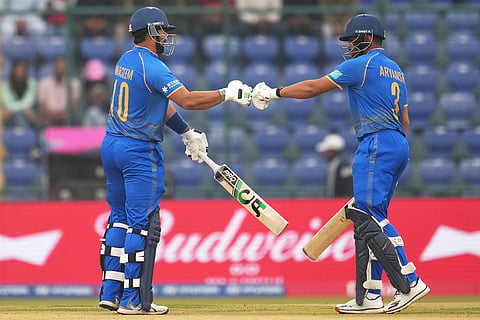 United Arab Emirates' captain Muhammad Waseem, left, and Aryansh Sharma celebrate during the T20 World Cup cricket match between South Africa and United Arab Emirates in New Delhi.