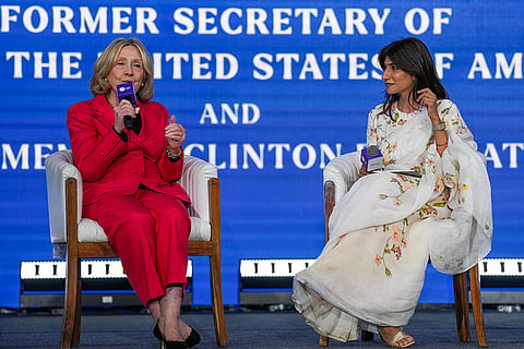 Mumbai: Former US Secretary of State Hillary Clinton, left, speaks during the Climate Week 2026, at Jio World Convention Centre in Mumbai.