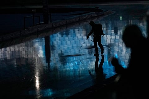 Cracks in the ice are being repaired ahead of team pursuit speedskating races at the 2026 Winter Olympics, in Milan, Italy.
