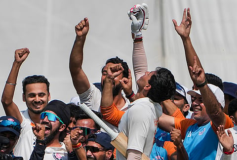 Jammu and Kashmir's Vanshaj Sharma with teammates celebrates after the team's victory in the Ranji Trophy semifinal cricket match against Bengal, at the Bengal Cricket Academy Ground, in Kalyani, West Bengal.