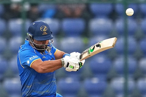 United Arab Emirates' captain Muhammad Waseem hits a boundary during the T20 World Cup cricket match between South Africa and United Arab Emirates in New Delhi, India.