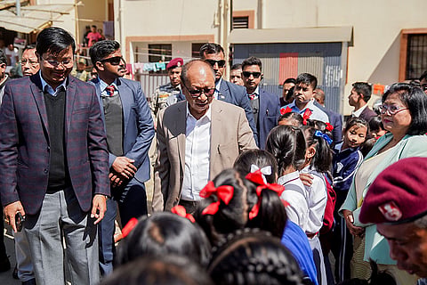 Manipur Chief Minister Yumnam Khemchand interacts with displaced children at the Alternate Housing Complex, Langol in Imphal.