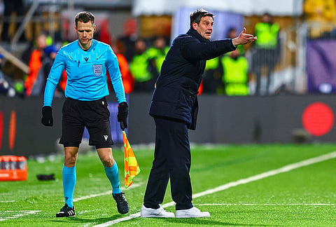 Inter Milan head coach Cristian Chivu directs his team during a Champions League soccer match against Bodø/Glimt in Bodo, Norway. 