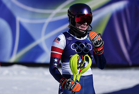 United States' Mikaela Shiffrin is overcome with emotion after winning an alpine ski, women's slalom race, at the 2026 Winter Olympics, in Cortina d'Ampezzo, Italy.