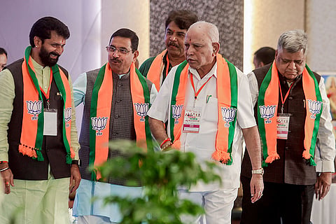 Union Minister Pralhad Joshi, with LoP in the state Legislative Assembly R Ashoka, former chief minister Jagadish Shettar, and BJP leader BS Yediyurappa, during the BJP Karnataka state executive committee meeting, in Bengaluru.