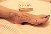 Writing With Fire: Literature In A Post-Epstein World | Photo: Imago/Zuma Press Wire : Image from the Epstein Files: A photo of a woman’s foot with a quote from Vladimir Nabokov’s novel Lolita