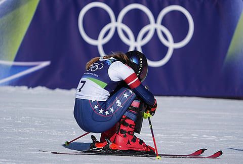 United States' Mikaela Shiffrin celebrates at the finish area of an alpine ski, women's slalom race, at the 2026 Winter Olympics, in Cortina d'Ampezzo, Italy.