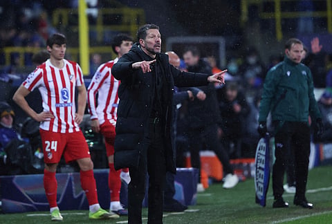 Atletico Madrid's head coach Diego Simeone reacts during the Champions League play-off first leg soccer match between Club Brugge and Atletico Madrid, in Bruges, Belgium.