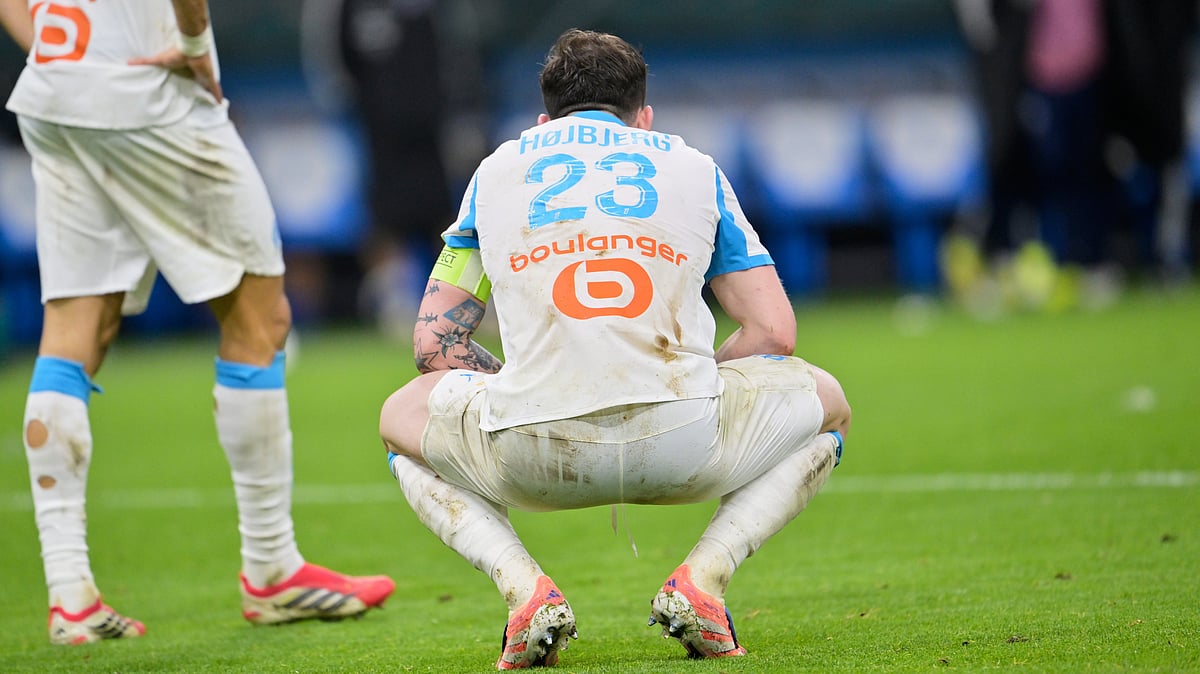 | Photo: AP/Philippe Magoni : Marseille's Pierre-Emile Hojbjerg reacts at the end of the French League One soccer match between Marseille and Strasbourg in Marseille, France, Saturday, Feb. 14, 2026. 