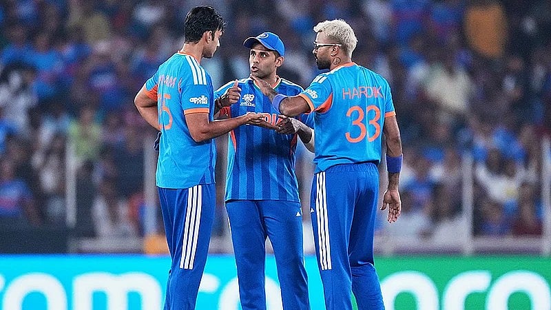 AP : Shivam Dube, left, captain Suryakumar Yadav and Hardik Pandya have a chat during the T20 World Cup match between India and Netherlands in Ahmedabad.
