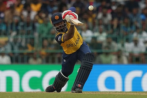 Sri Lanka's Kusal Mendis plays a shot during the T20 World Cup cricket match between Sri Lanka and Zimbabwe in Colombo, Sri Lanka.