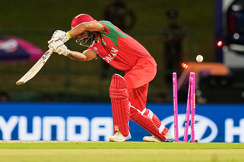 Oman's Captain Jatinder Singh is bowled out by Australia's Xavier Bartlett during the T20 World Cup cricket match between Australia and Oman in Pallekele, Sri Lanka, Friday, Feb. 20, 2026.