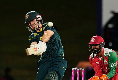 Australia's captain Mitchell Marsh hits a six during the T20 World Cup cricket match between Australia and Oman in Pallekele, Sri Lanka.