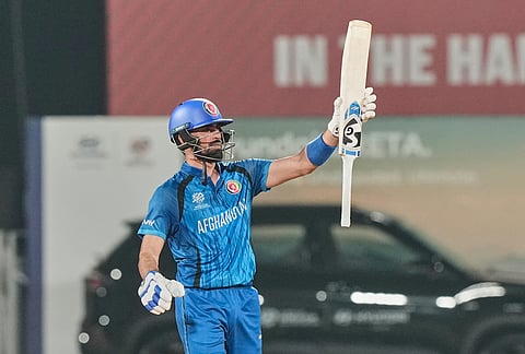 Afghanistan's Ibrahim Zardan celebrates his fifty runs during the T20 World Cup cricket match between Afghanistan and Canada in Chennai.