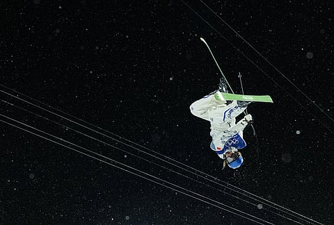 China's Eileen Gu competes during the women's freestyle skiing halfpipe qualifications at the 2026 Winter Olympics, in Livigno, Italy.